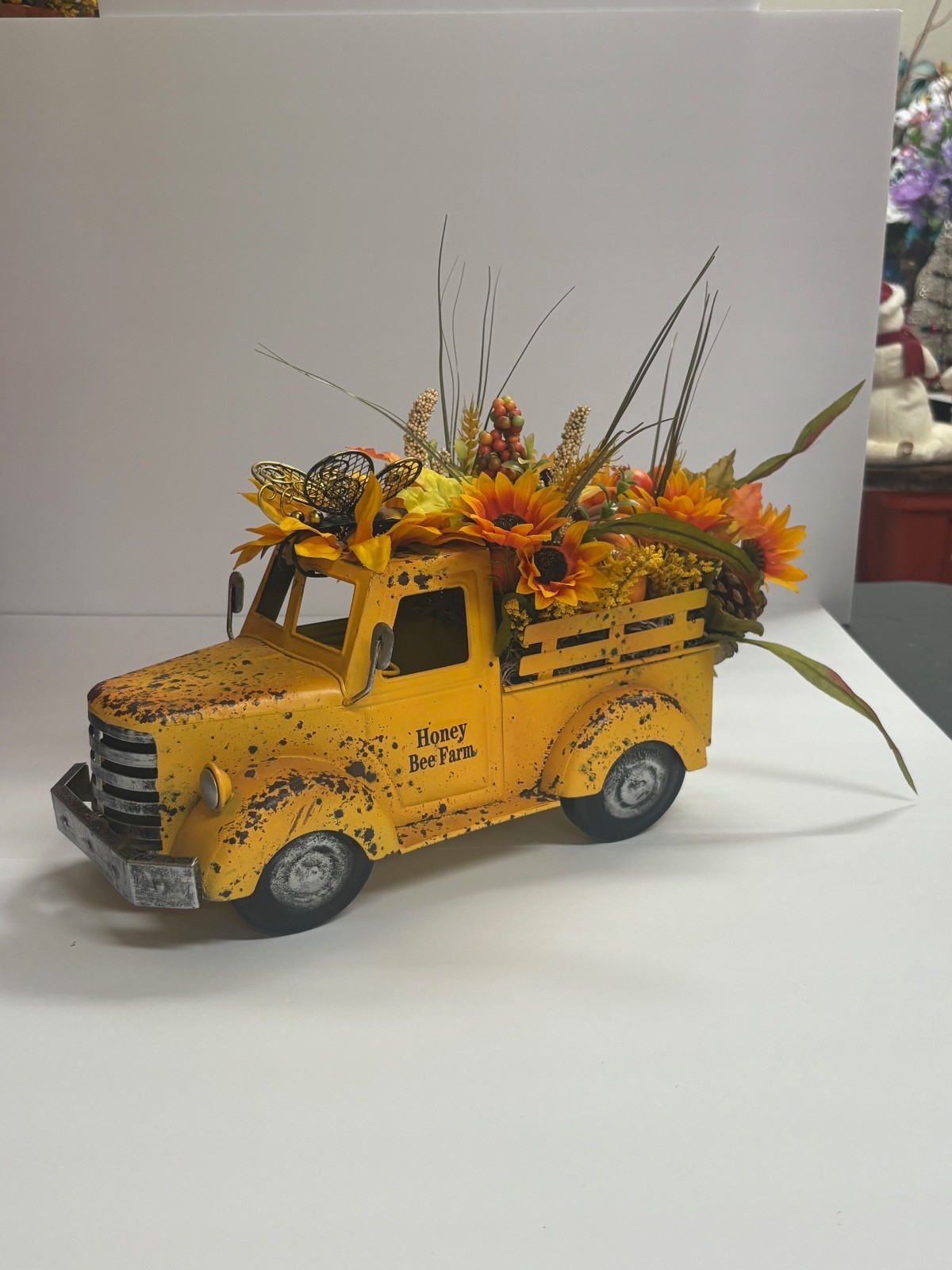 Rustic Yellow Honey Bee Farm Truck Planter with Sunflower Floral Arrangement