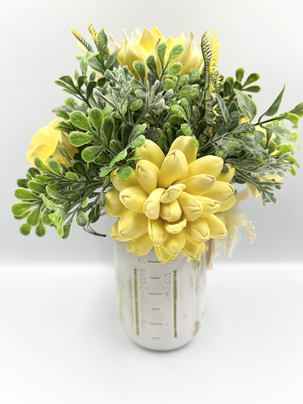 Yellow Sola Wood Flower Arrangement In Ball Canning Jar