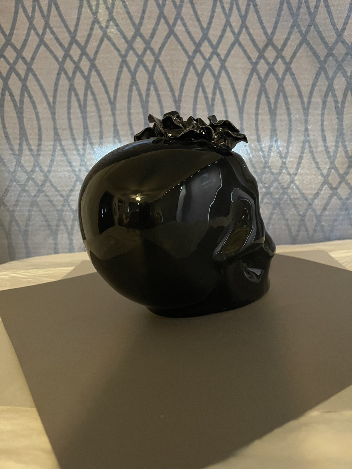 black glossy skull decoration with faux black roses