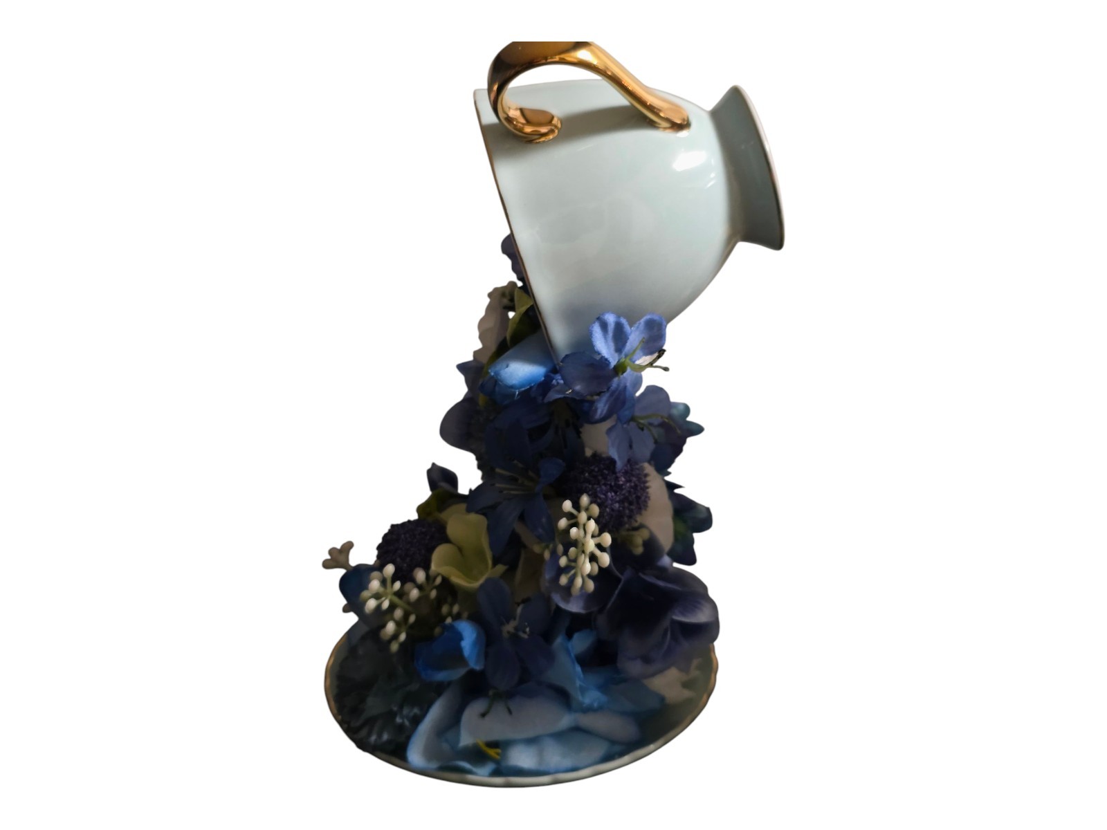Floating Tea Cup Decorated With Faux Flowers Arrangement