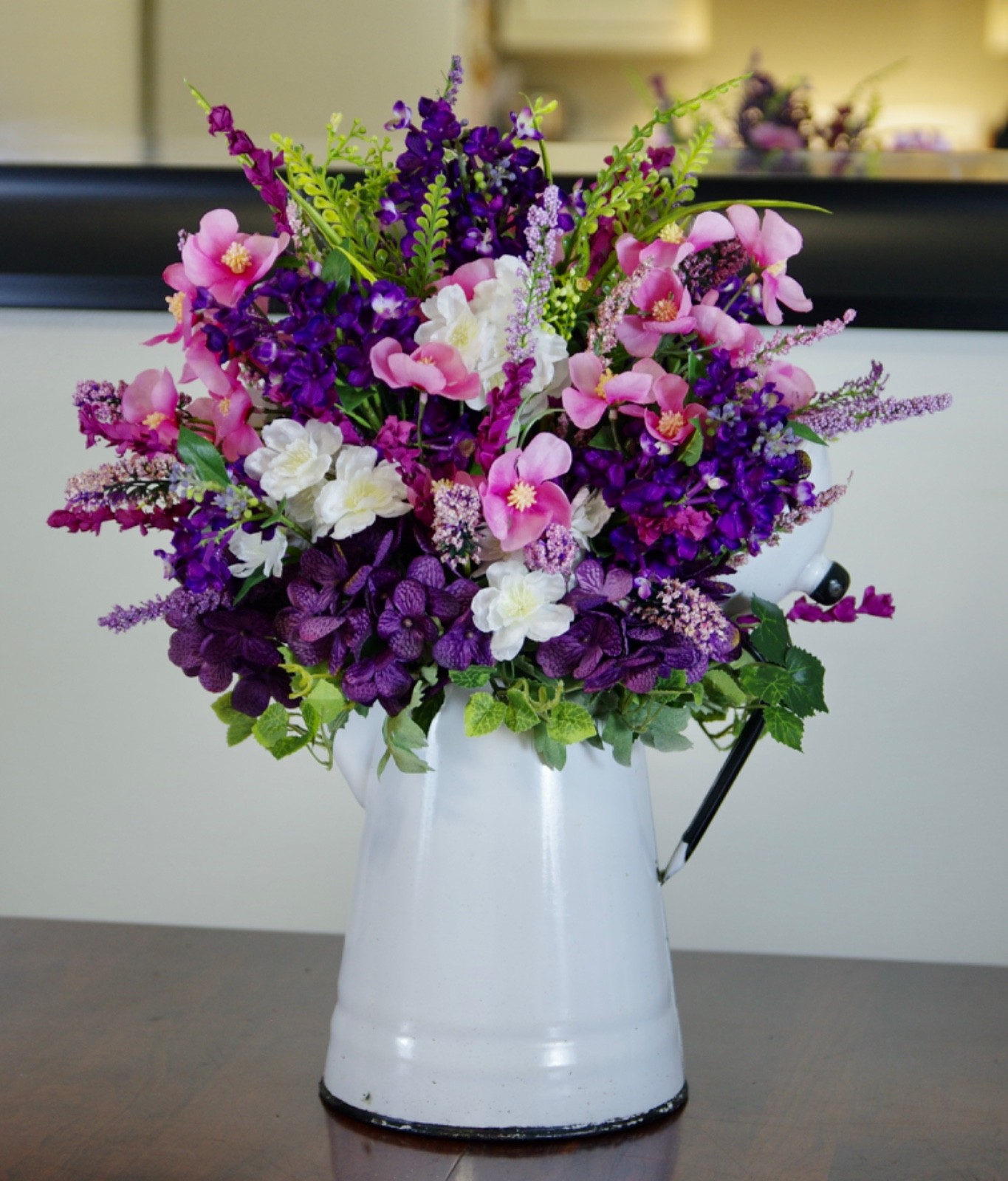 Silk Pink and Purple Arrangement in a Vintage Enamel White Cowboy Coffee Pot