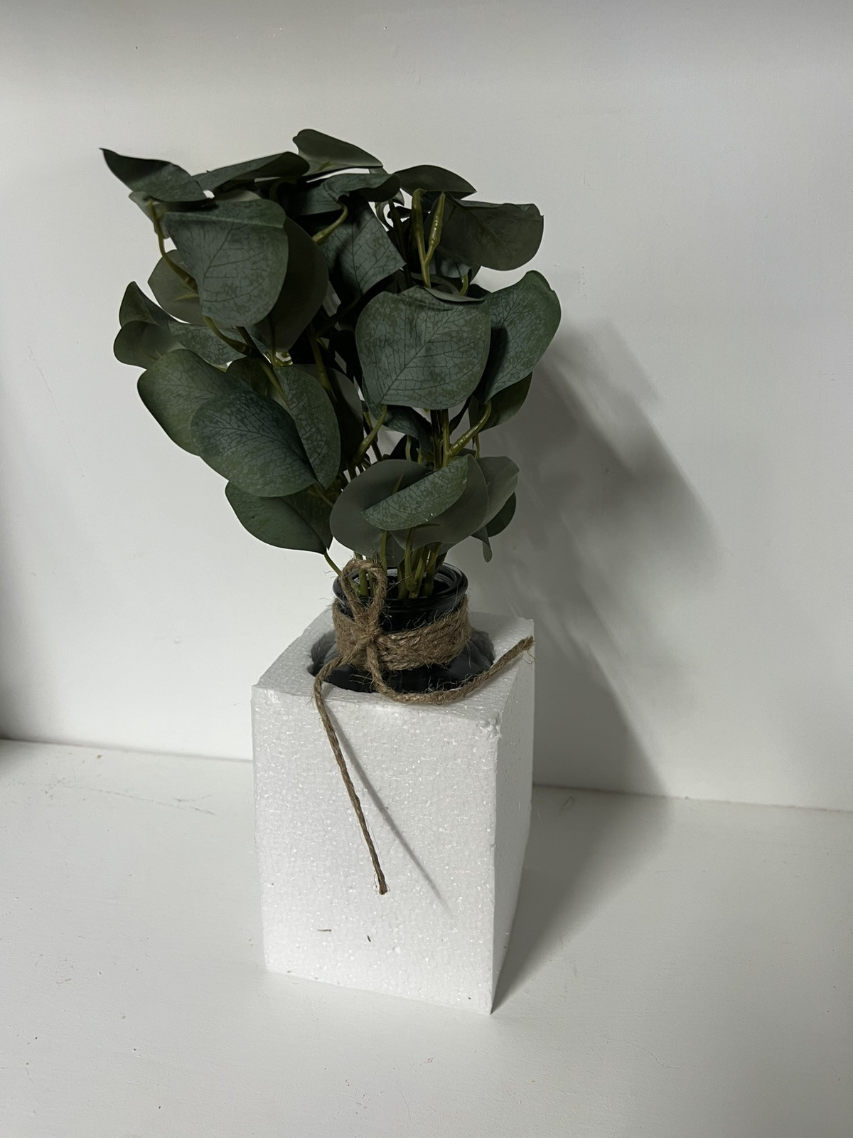 Artificial Eucalyptus Stems in Black Glass Vase with Faux Water, 14″, With Bow