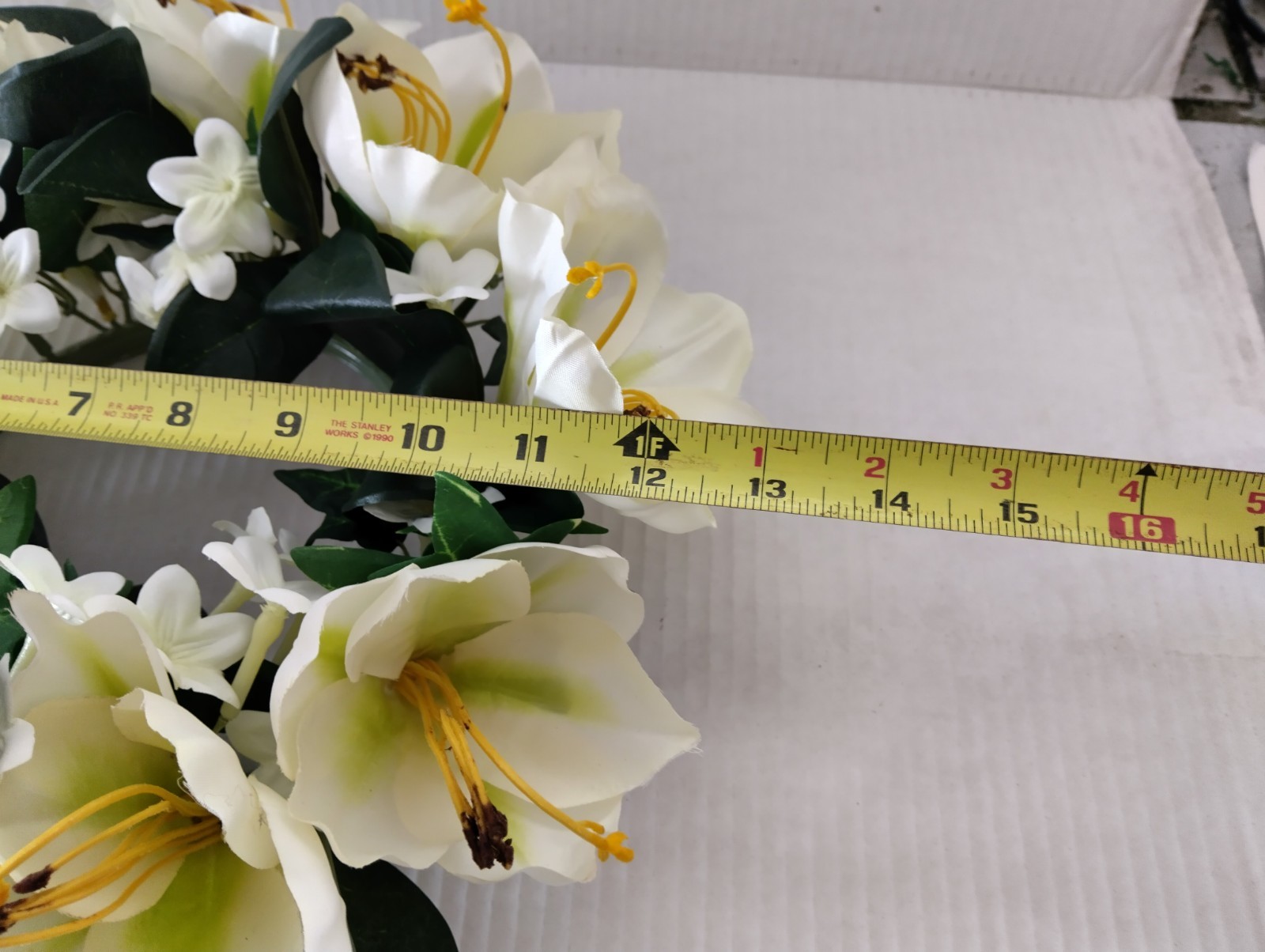 Amaryllis candle ring for a 6″ pillar candle or cremation urn.