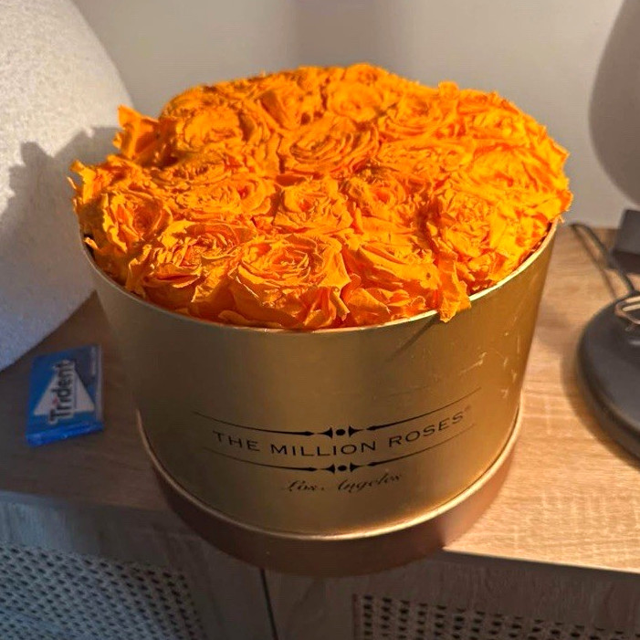 The Million Roses Orange Rose Flower Box Arrangement in Gold Hat Box
