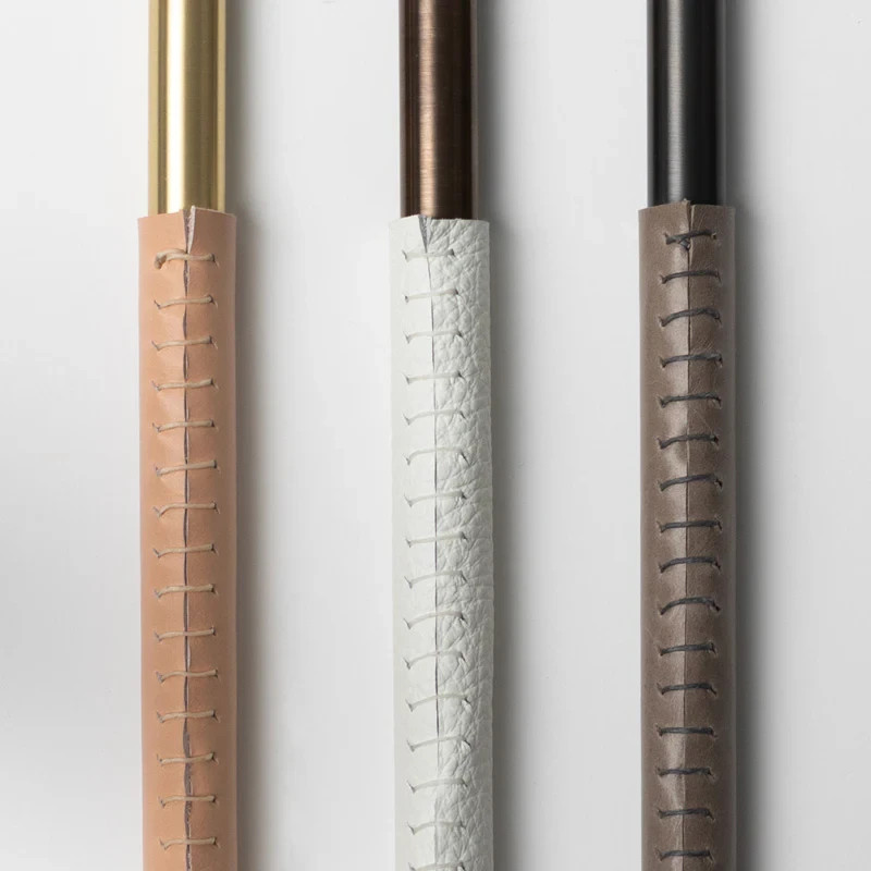 The Ellis Light is made from solid brass, with an optional leather wrap that is