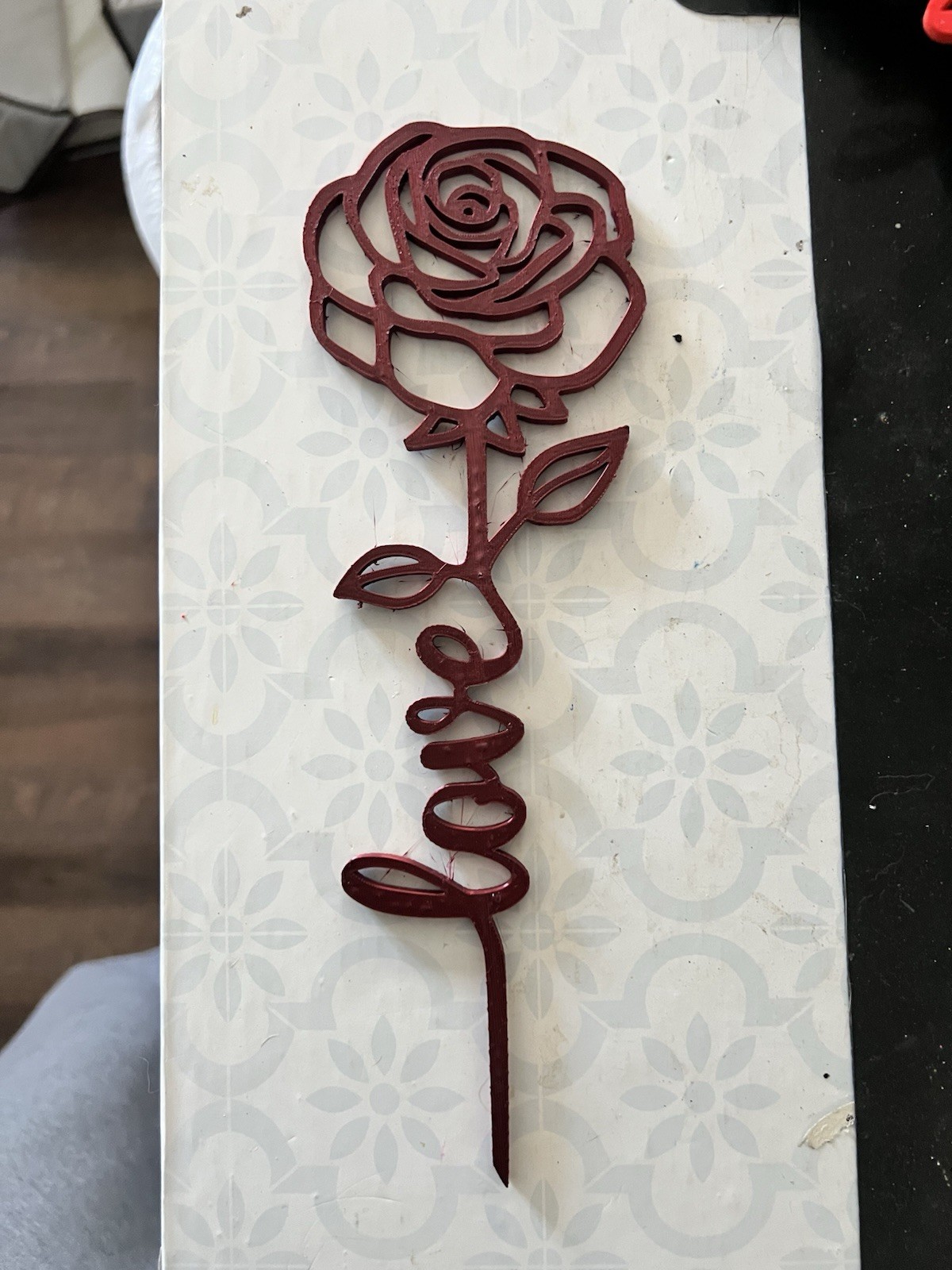 Red 3D printed flower at home, for Valentine’s Day. Keep able to forever