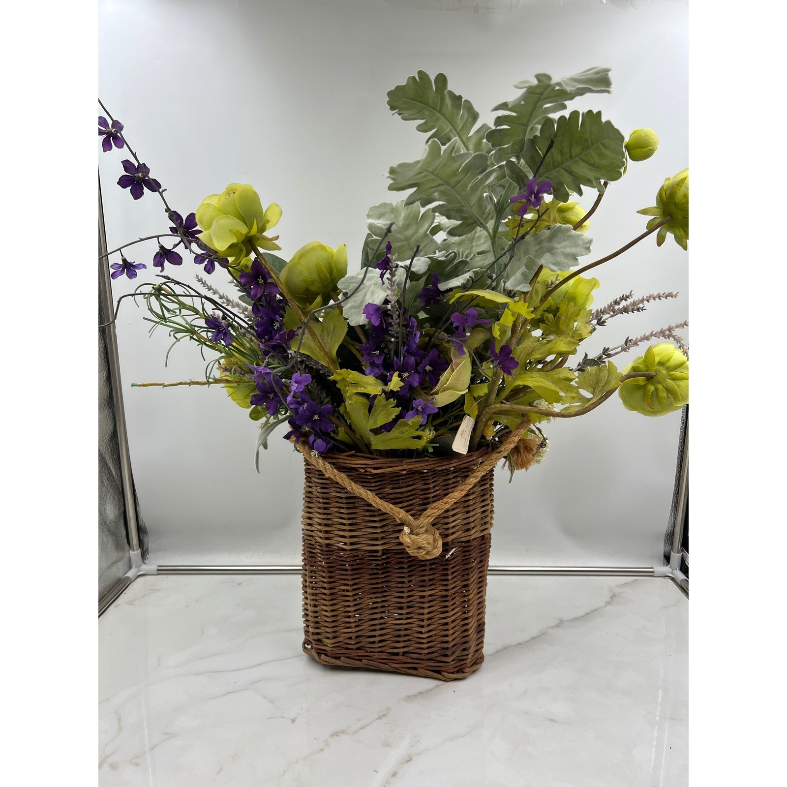 Artificial Lime Green Ranunculus & Purple Floral Arrangement in Wicker Basket