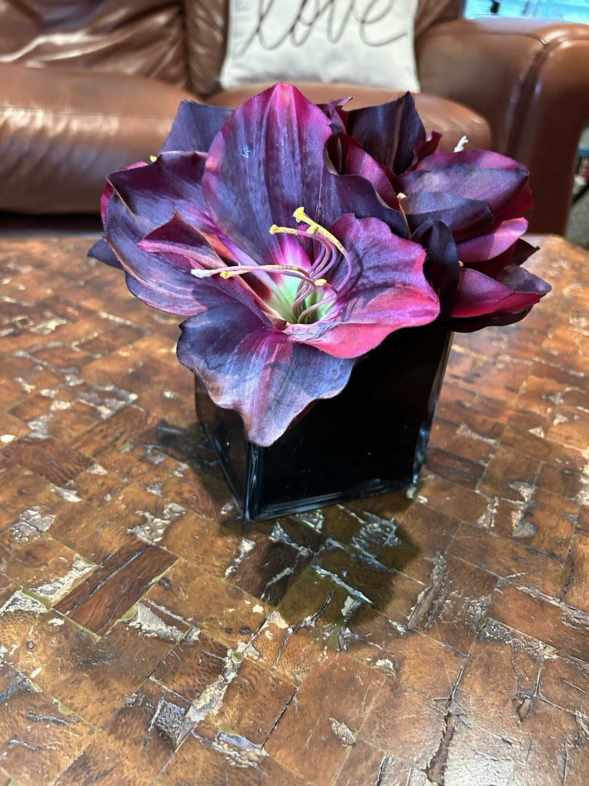 Artificial Amaryllis in Black Glass Vase