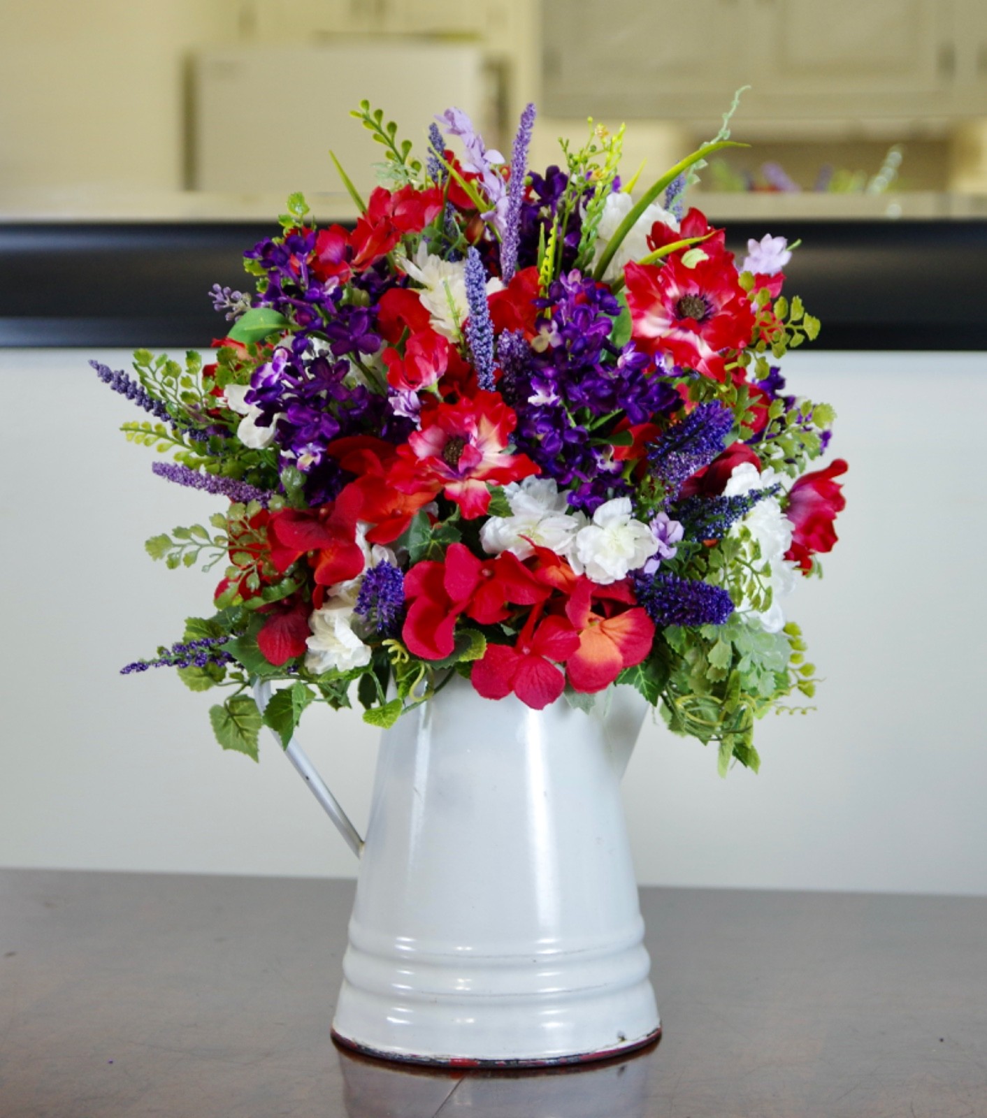 Silk Red and Purple Arrangement in Vintage Enamel Red & White Cowboy Coffee Pot