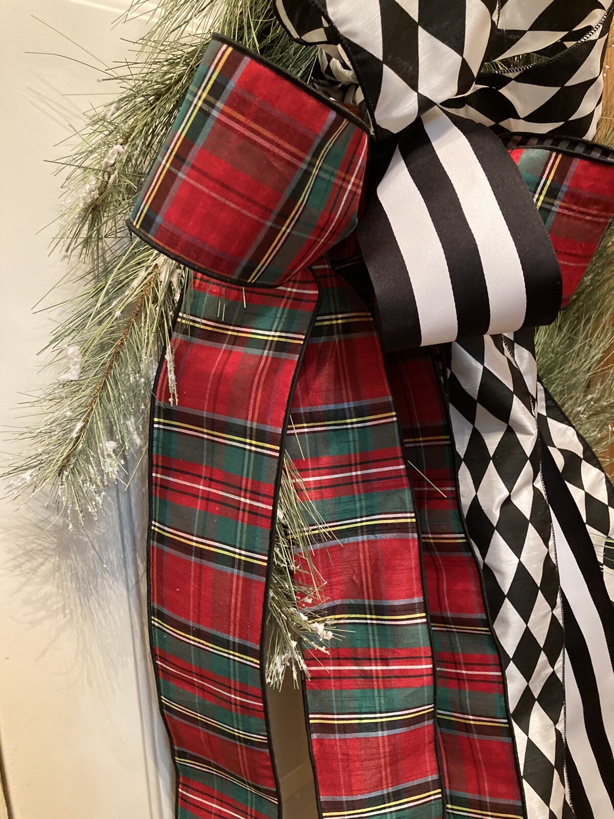Long Snowy Needled Pine Wreath Wrapped In Exquisite Ribbon