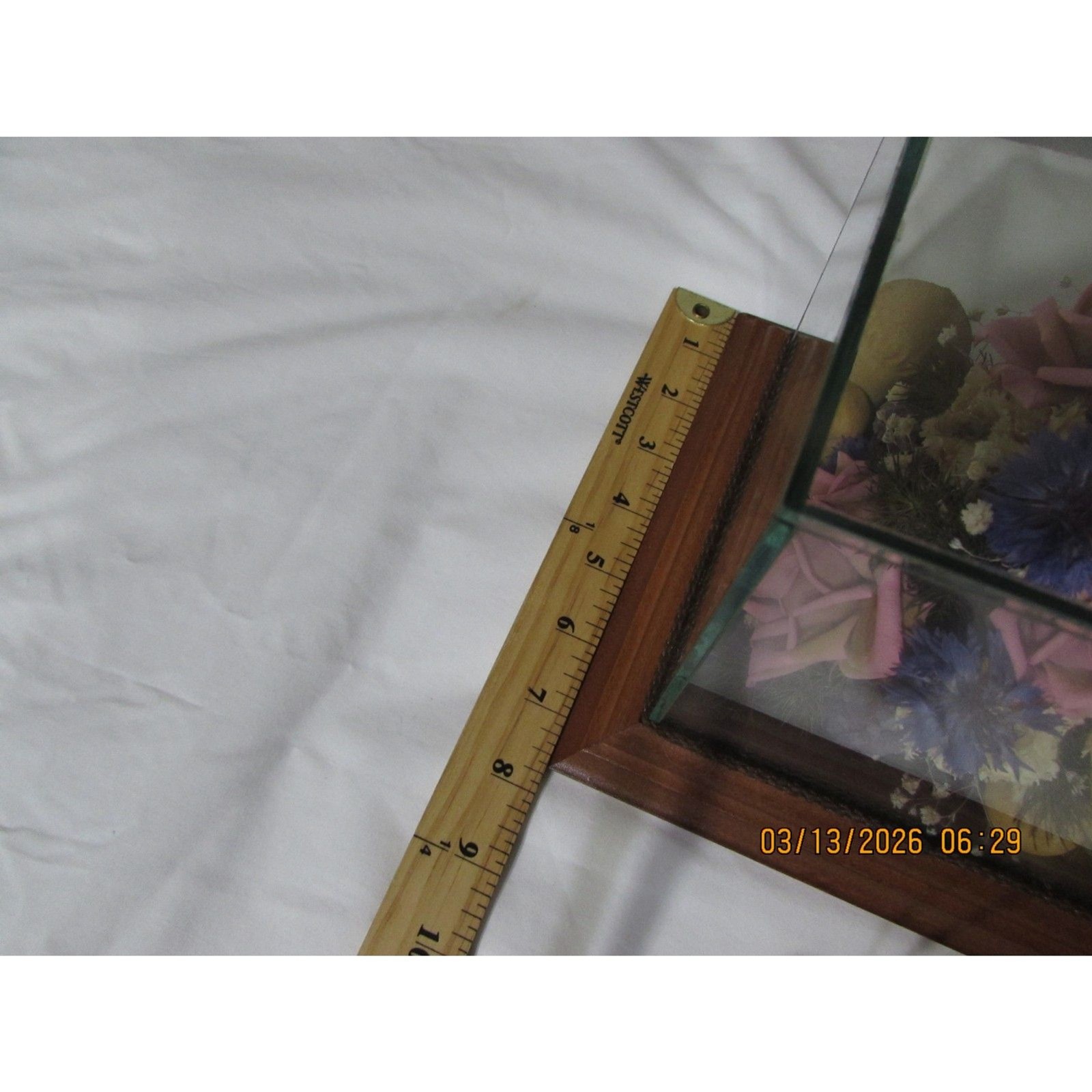 Vintage dried flower arrangement in glass with wood base butterfly mushrooms