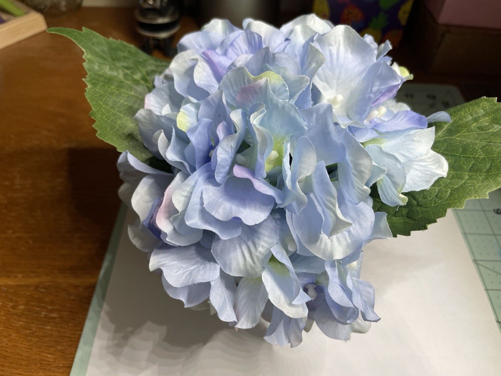 7 In Faux Blue Hydrangea In Paper Pot By Ashland 8 Pots Reg. Price $9.99 Each