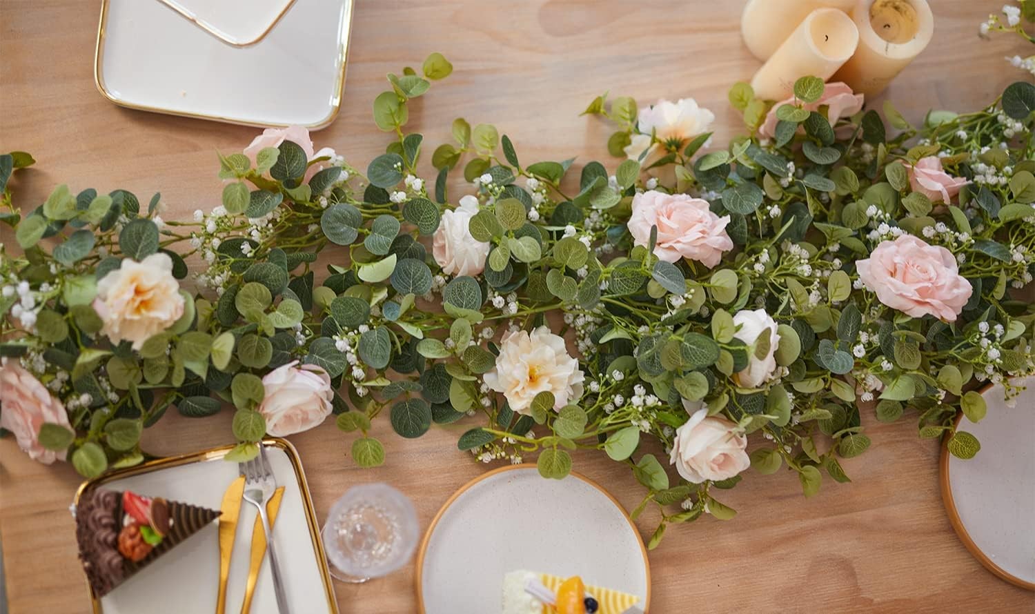 Artificial eucalyptus wreath with flowers, fake roses, and baby’s breath flowers