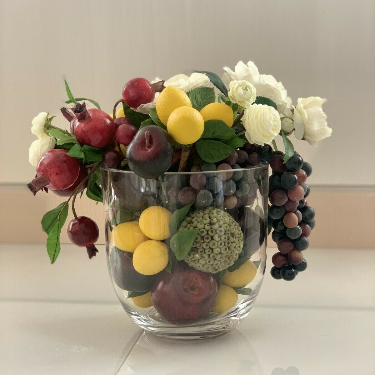 Pomegranate, Lemon, Grapes with Flower Centerpiece Arrangement with Clear Vase 