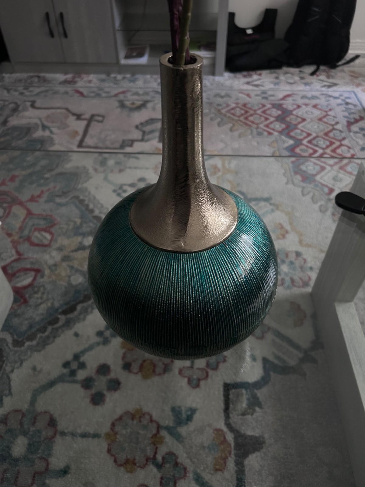 Faux Green Hydrangea stems with bulbous teal and sliver enamel vase